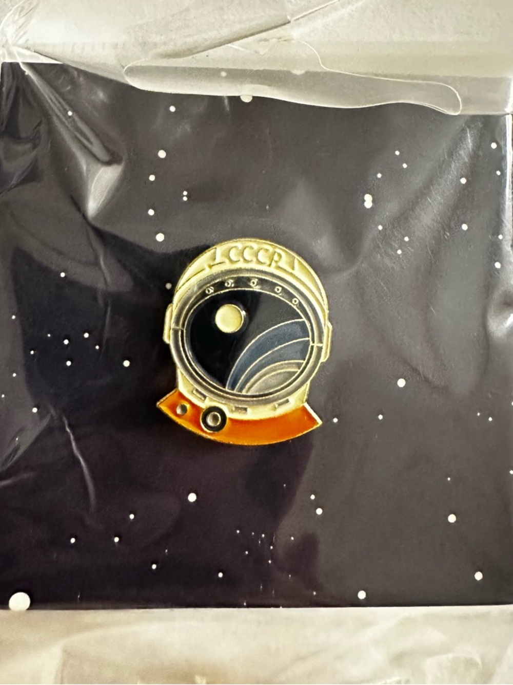 CCCP Cosmonaut Helmet Enamel Pin - Black & Gold with Orange Accent